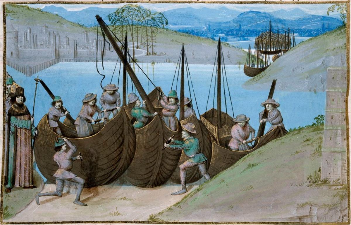 Detalle de una miniatura de la construcción de la flota de barcos de César. Ilustración de finales del siglo XV que contiene un tema de historia antigua (la expedición de César a Inglaterra) pero muestra barcos medievales. Origen: Países Bajos, (Brujas)